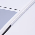 Close-up of the white drawing board edge showing a clear guide strip and black trim