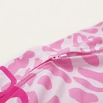 Close-up of pink zipper and irregular print