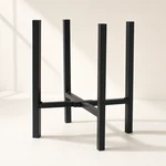 Black stand from a low angle showing straight legs and support rails