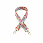 Blue and coral geometric bag strap looped with two gold-tone clips and a rectangular adjuster