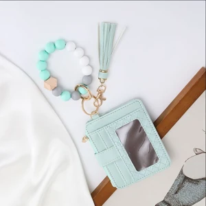 Option 1: mint card holder with ID window, bead wristlet and matching tassel