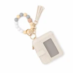 Cream card holder showing ID window, card slots and attached bead loop