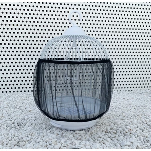 Jupe récupératrice de graines pour cage à oiseaux