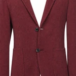Close view of the burgundy blazer’s fine texture, notched lapels and two dark buttons.