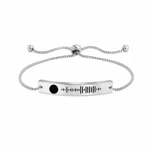 Silver music-code bracelet with curved bar and sliding box chain on white