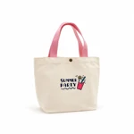Pink-handled canvas bag with drink print on white