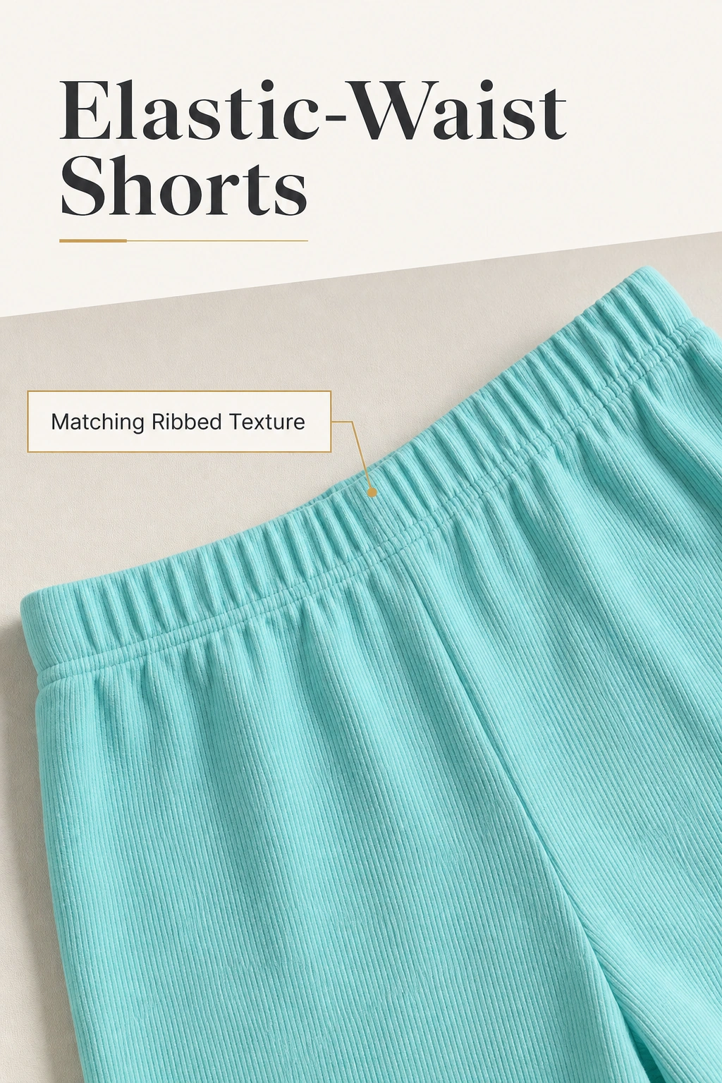 Close-up of the mint shorts' elastic waist and matching ribbed texture