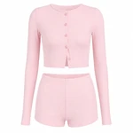 Pink long-sleeve crew-neck top with five front buttons and matching elastic-waist shorts on white