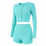 Mint long-sleeve button-front top and matching elastic-waist shorts shown at an angle on white