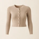 Three-quarter front view of a beige cropped knit cardigan with seven buttons, with the top button open, on a beige background