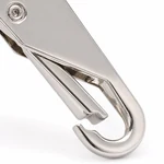 Macro view of the silver-tone spring-gated hook on the detachable zipper pull tab.