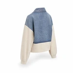 Rear view of blue and beige patchwork jacket
