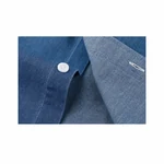 White button and stitched buttonhole on blue denim