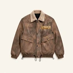 Brown snap-front jacket with large flap pockets and gathered cuffs
