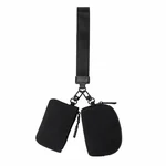 Black nylon dual pouch wristlet set with rectangular and rounded zip pouches and wrist strap on white