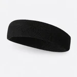 Black terry headband at a low side angle