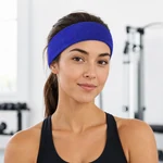 Woman wearing a blue-violet plain headband