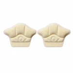 Two beige dotted heel pads presented on a white background