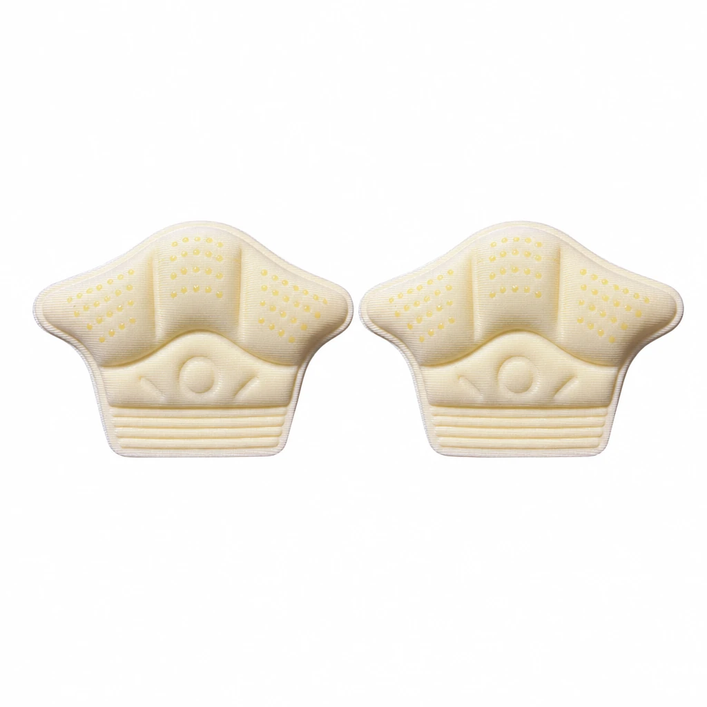 Two beige wing-shaped foam heel liners with dotted surfaces, shown as one selected pair