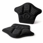 Black heel pads shown upright and from a low side angle