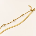 Close view of the fine bead chain and wider flat snake chain