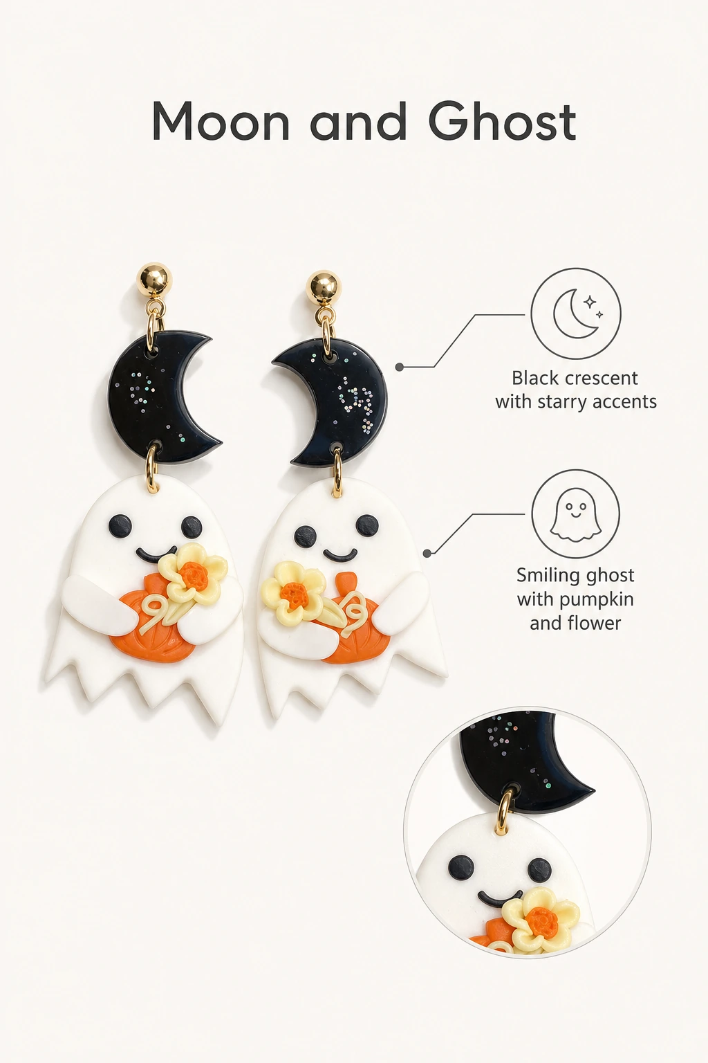 Black crescent and white ghost earrings with close detail inset