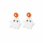 Pair of white ghost earrings with orange flower studs on a white background