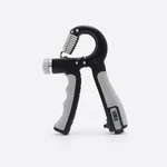 Gray-and-black hand gripper photographed from the side