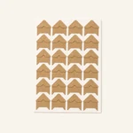Kraft-brown sheet of 24 photo corners viewed from above