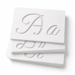 White-background stack of separate cursive Aa, Bb and Cc Joyart stencil sheets.