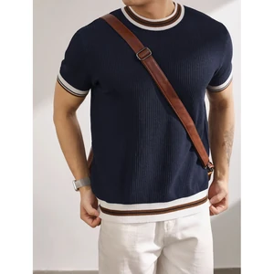 Blue option photograph showing a navy knit top with striped trim worn by a man
