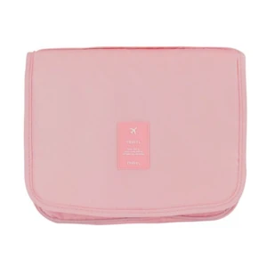 Original color photo of the closed Pink bag with its front stitched patch