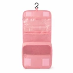 Empty pink hanging organizer showing the clear upper pocket and mesh compartments