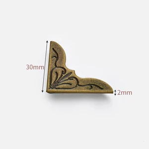 mugu iron book-corner fitting in Bronze