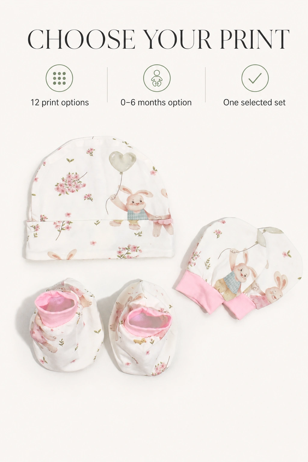 Conjunto con conejos e información de 12 estampados y opción de 0–6 meses