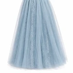Close view of the blue gathered skirt showing its floral lace pattern, sheer outer layer, and hem detail.
