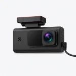 Black dash camera with a front lens, top mounting bracket and cable at its side