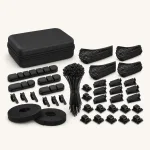 Black cable sleeves, ties, clips and routing holders arranged beside a zippered storage case
