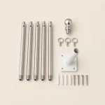 Flag pole sections, finial, attachment rings and wall bracket arranged in rows