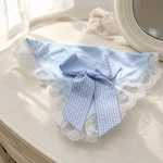 Blue style example: Blue and white fabric headpiece with lace detailing