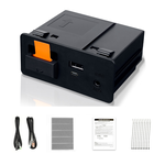 Module noir avec USB-A et USB-C au-dessus d’un ensemble de faisceaux de câbles, d’éléments en mousse grise, de documentation et de colliers de serrage