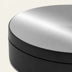 Close-up of the black turntable reflective platform and upper rim