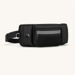 Riñonera negra con bolsillo frontal de malla, compartimentos con cremallera, franja gris y cinturón ajustable