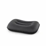 Inflated dark gray travel pillow with a curved rectangular outline and recessed channels across the top