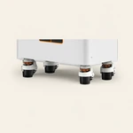 Close-up of the battery cabinet’s lower white edge and wheel-support assemblies