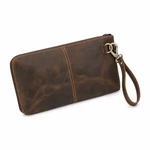 Coffee-brown leather wristlet clutch, rear view with a centre seam and clipped wrist strap on white.