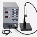 Front view of the gray welder showing two red displays, arrow buttons, program selectors and pen stand