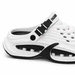 Dettaglio del lato inferiore del sabot bianco e nero, con ampie aperture e supporti interni bianchi