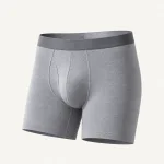 Vista frontal de boxers cinzentos com cintura escura e painel frontal modelado