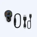Vista superior de un cargador redondo para coche junto a cables USB negros.